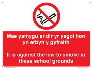 Mae ysmygu ar dir yr ysgol hon yn erbyn y gyfraith It is against the law to smoke in these school grounds - Bilingual Welsh / English